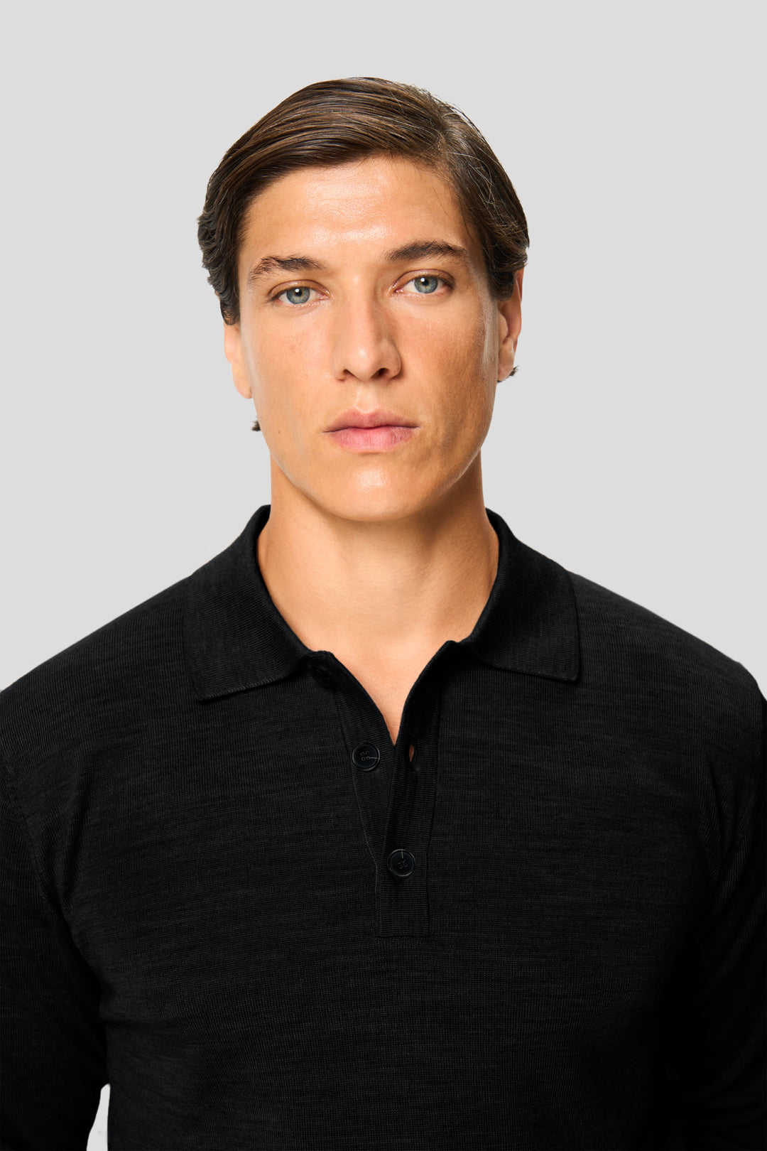 Sort merino langærmet polo med knapper